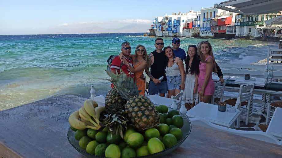 Family posing in Little Venice, Mykonos